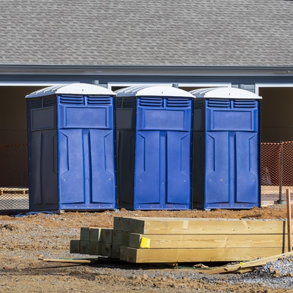 what is the cost difference between standard and deluxe portable toilet rentals in Penns Park